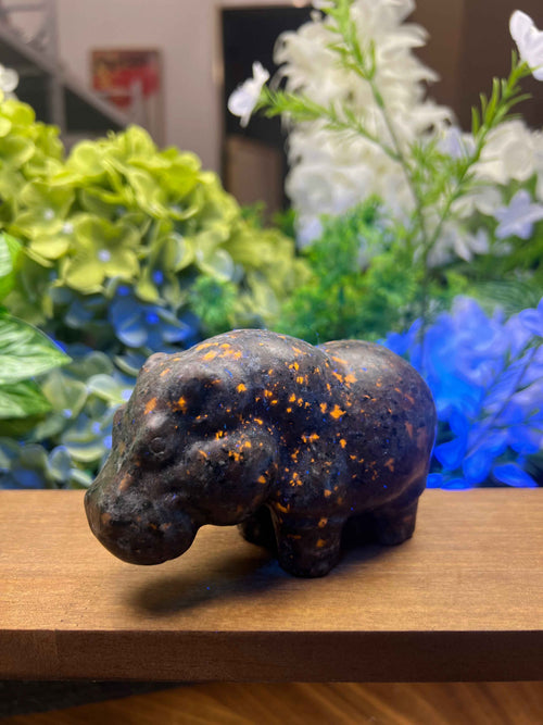 Enchant Your Space with the Unique Yooperlite Hippo Carving - Medium Size